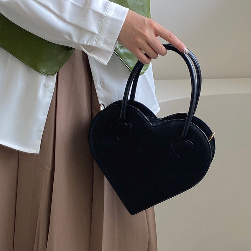 Nora | Elegant Handbag with Adjustable Strap and Ample Storage-1