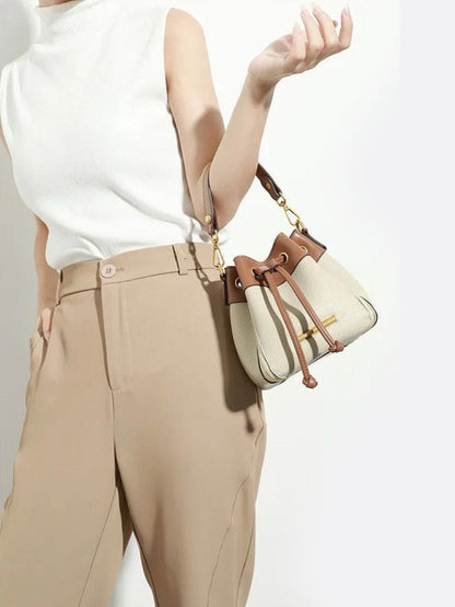Genuine Leather Bucket Handbag with Removable Straps and Zipped Pocket – Chic Crossbody Tote in Cowhide Leather 1